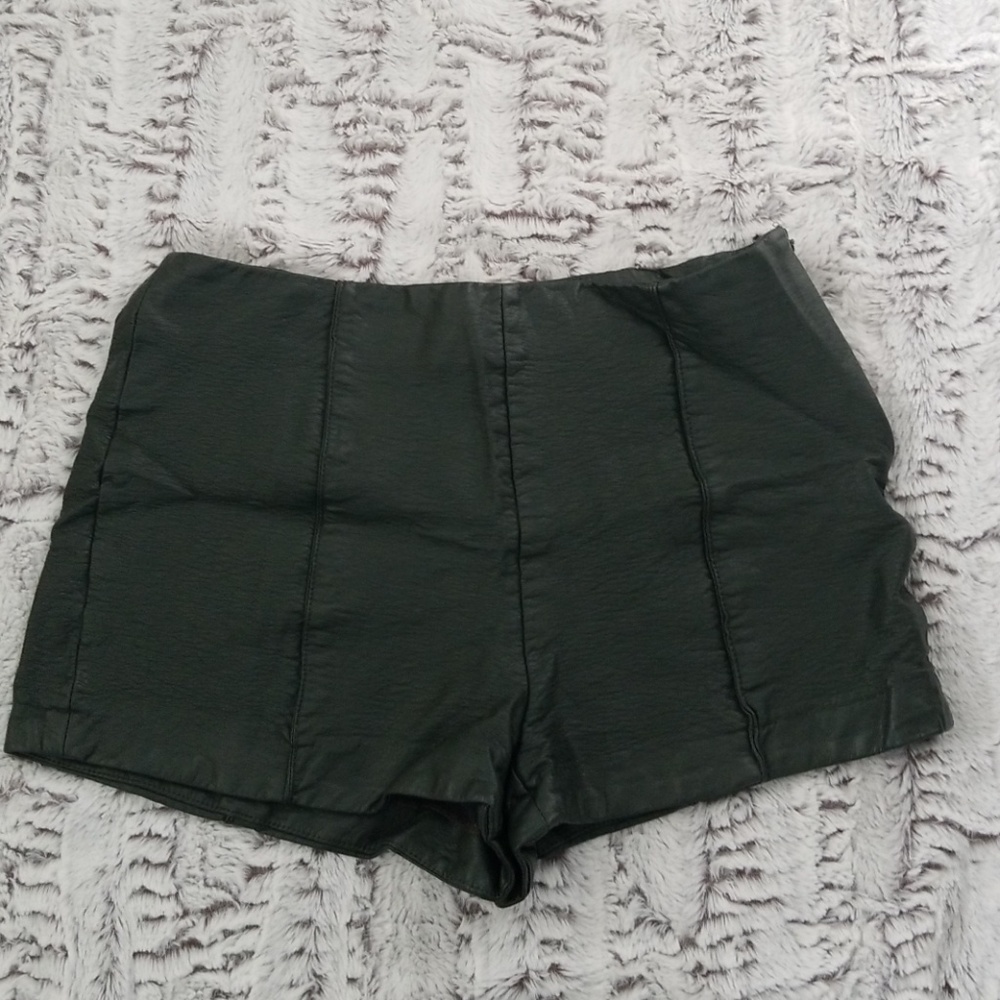 Green leather shorts